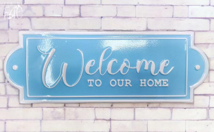 Welcome To Our Home Enamel Wall Sign – Blue  |  Quote Wall Plaques Homewares Quote Wall Plaques