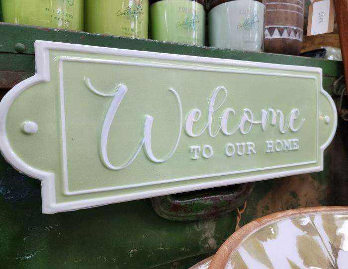 Welcome To Our Home Enamel Wall Sign – Green  |  Quote Wall Plaques Homewares Quote Wall Plaques